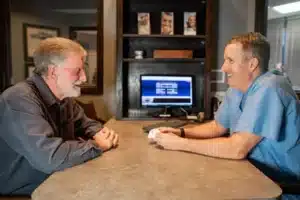 Dr. Dooley meeting a patient to discuss a smile makeover